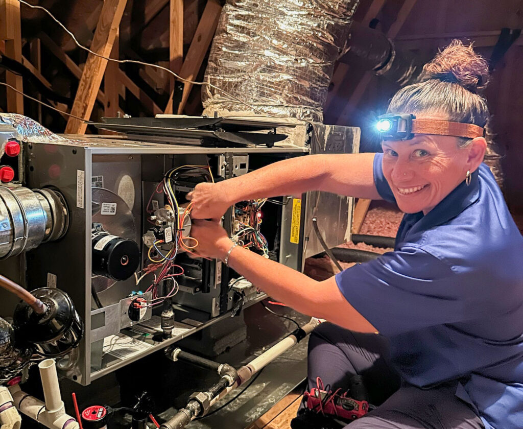 Technician providing heating replacement in Charlotte.